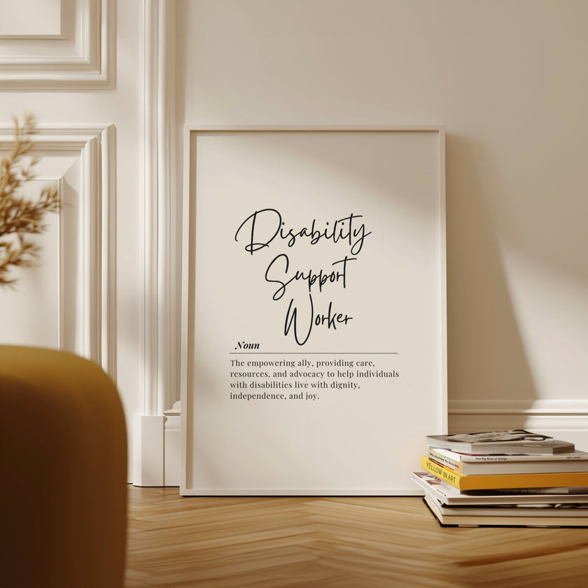 Modern typography print with 'Disability Support Worker' in bold script against white background, featuring definition text in elegant serif font with wooden frame