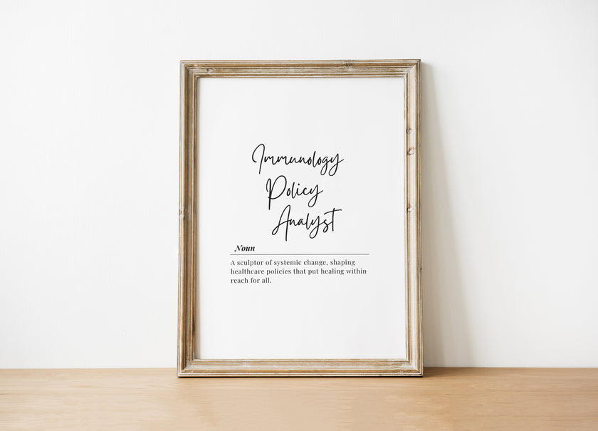 Monochrome typography print featuring 'Immunology Policy Analyst' definition with elegant script and serif fonts against white background, framed in sleek wood for professional healthcare settings.