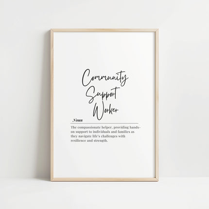Elegant black typography on a white background featuring the words 'Community Support Worker' in calligraphic font with the professional definition below, creating a minimalist inspirational design for social work office walls.