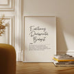 Elegant black typography print featuring 'Evolutionary Developmental Biologist' in modern script against white background with definition text in clean serif font, framed in natural wood