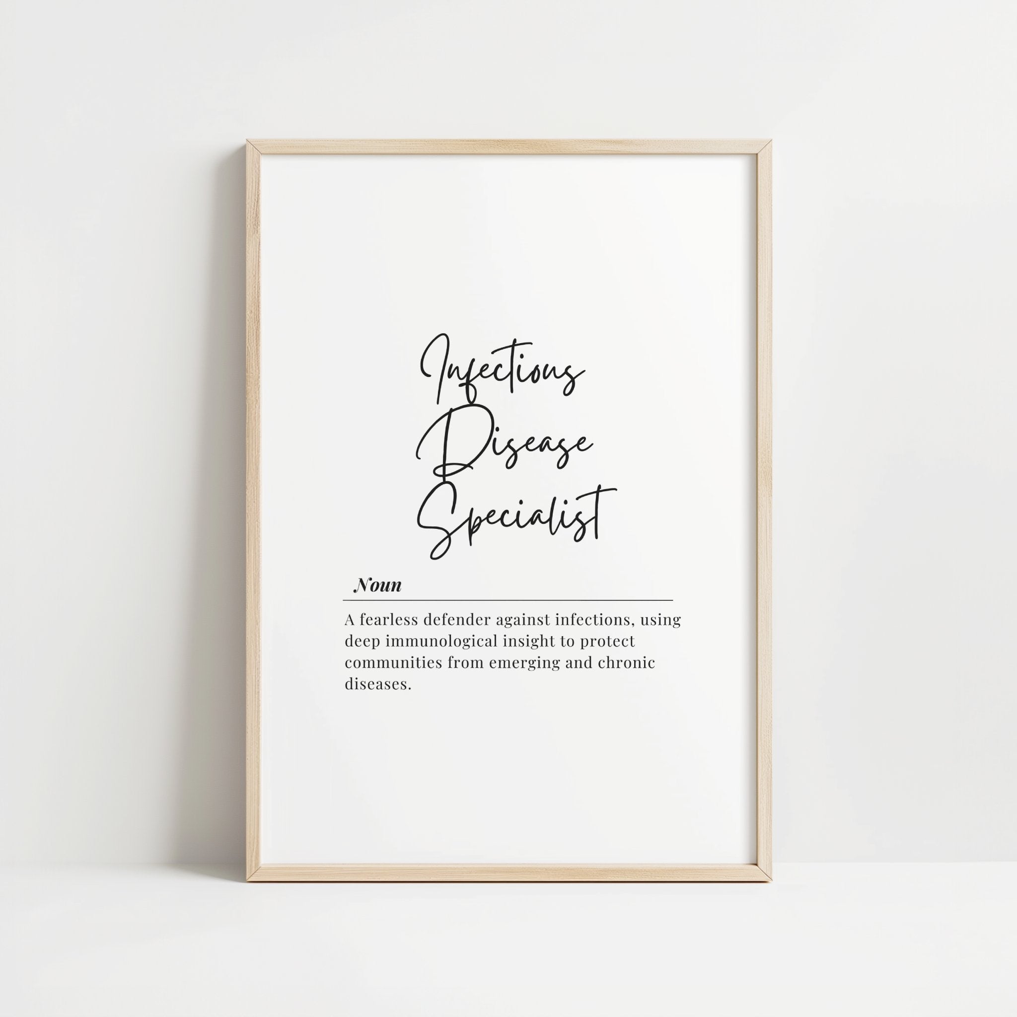 Elegant black script typography displaying 'Infectious Disease Specialist' definition against white background, framed in natural wood, conveying professional expertise in a minimalist medical aesthetic.