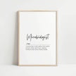 Minimalist typography print featuring 'Microbiologist' in bold cursive against white background with professional black serif definition text below, creating a clean intellectual aesthetic in a simple wooden frame.