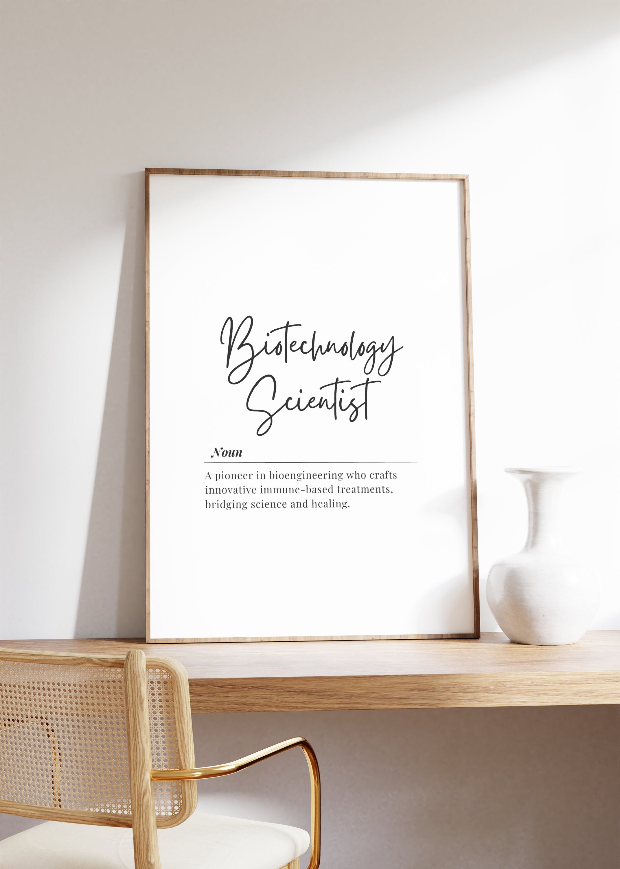 Modern minimalist biotechnology scientist definition print featuring elegant black script typography on white background, showcasing the inspiring definition about bioengineering and innovative immune-based treatments