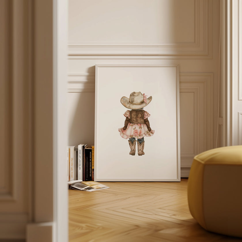 Whimsical illustration of young girl wearing cowboy hat, pink floral dress and boots against white background, creating a soft botanical aesthetic perfect for nursery or children's room decor.