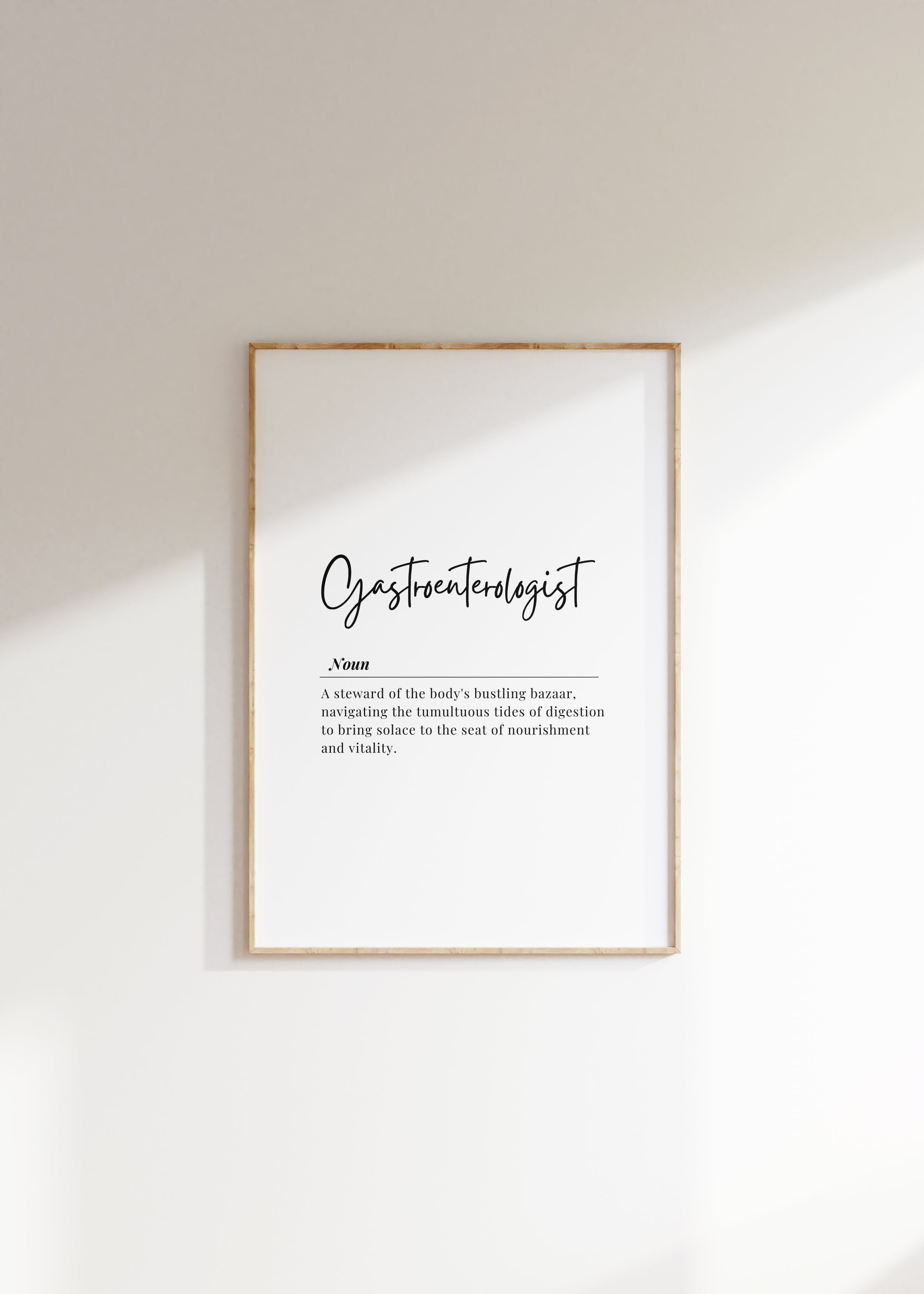 Elegant monochrome typography print featuring 'Gastroenterologist' in bold script with a poetic definition against white space, creating a sophisticated professional decor piece for medical settings.