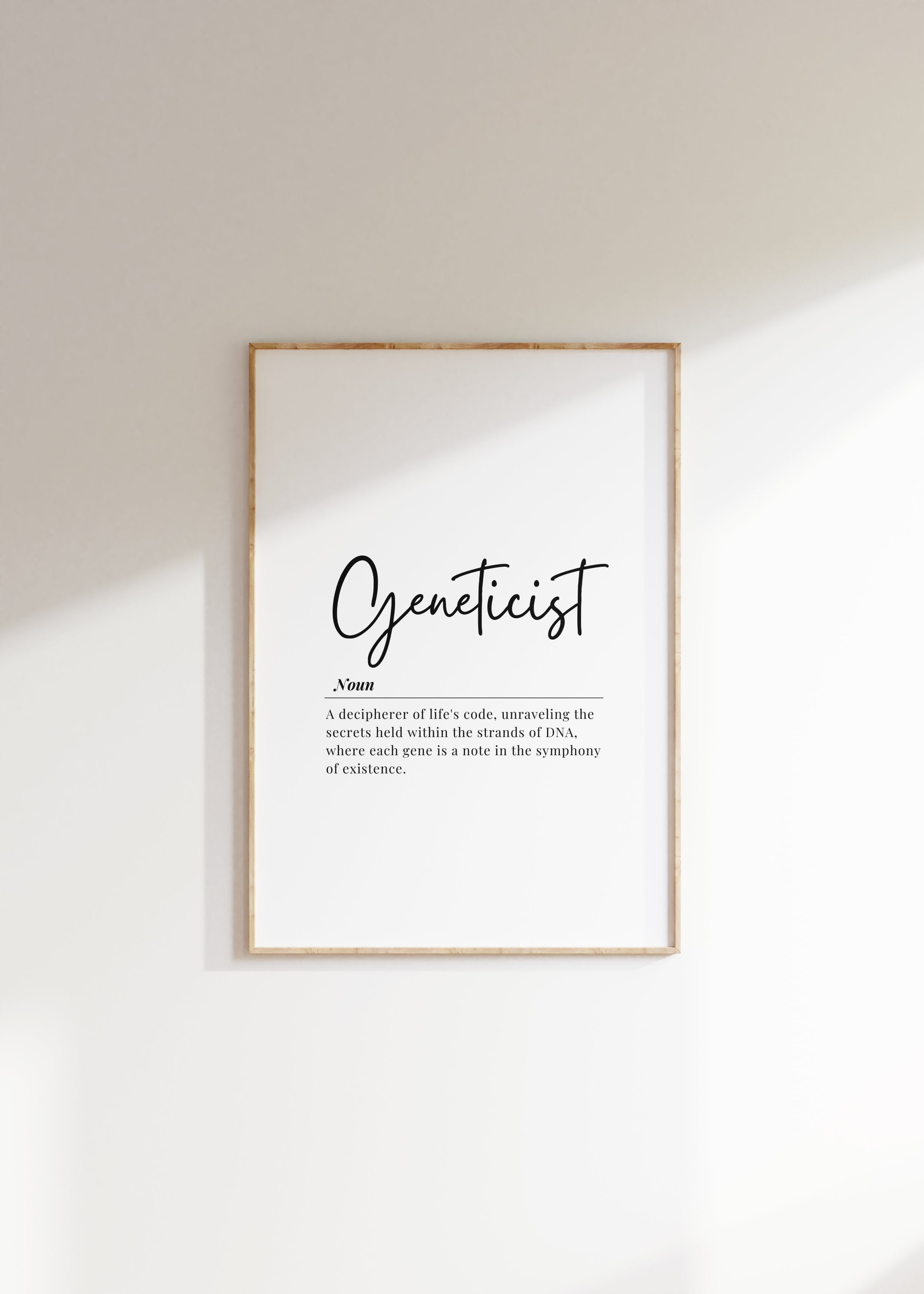 Minimalist typography print featuring 'Geneticist' in bold black lettering against white background, with professional definition below in sans-serif font, framed in natural wood for scientific workspace decor.