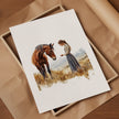 Serene vintage print of girl with horse in warm earth tones and sage greens, showcasing gentle interaction against white background with rustic wooden frame for farmhouse living spaces.