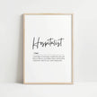 Minimalist typographic design featuring 'Hospitalist' in bold script against a white background with an elegant definition below, framed in natural wood for a calming professional environment.