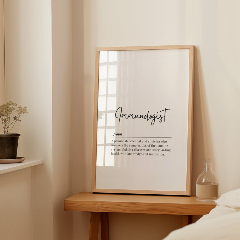 Elegant black script 'Immunologist' text on white background with professional definition in sans-serif font, creating a clean, modern aesthetic ideal for medical offices or healthcare settings.