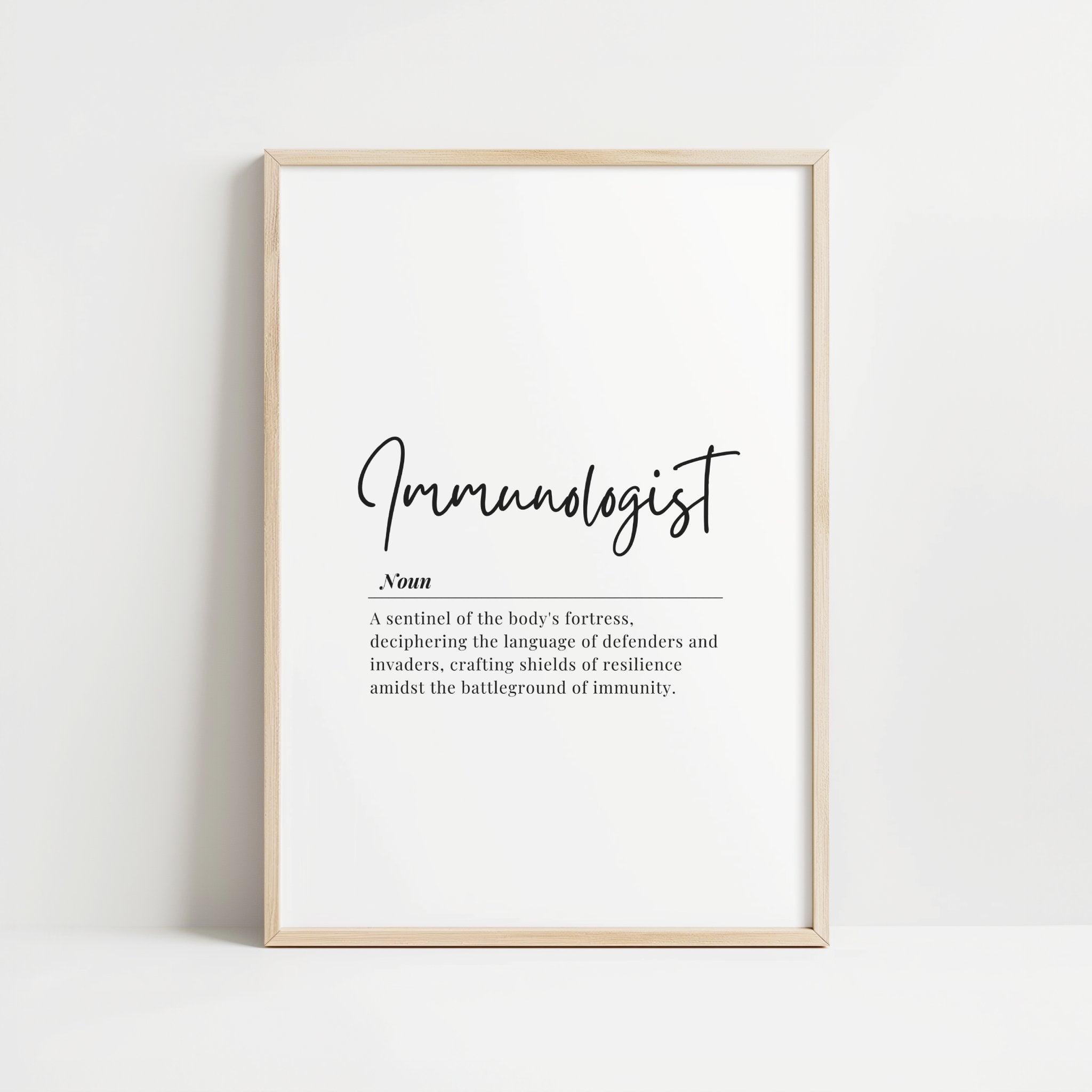 Modern typography print featuring 'Immunologist' in elegant black script with a poetic definition against a clean white background, framed in natural wood for professional medical spaces.