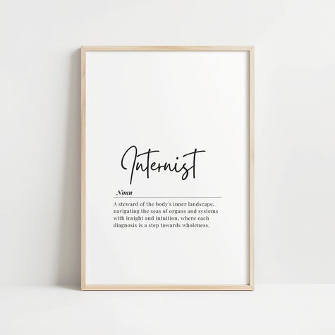 Minimalist typography print featuring 'Internist' in bold sans-serif font with an elegant definition beneath on white background with wood frame, creating a sophisticated professional aesthetic.