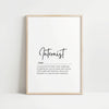 Minimalist typography print featuring 'Internist' in bold sans-serif font with an elegant definition beneath on white background with wood frame, creating a sophisticated professional aesthetic.