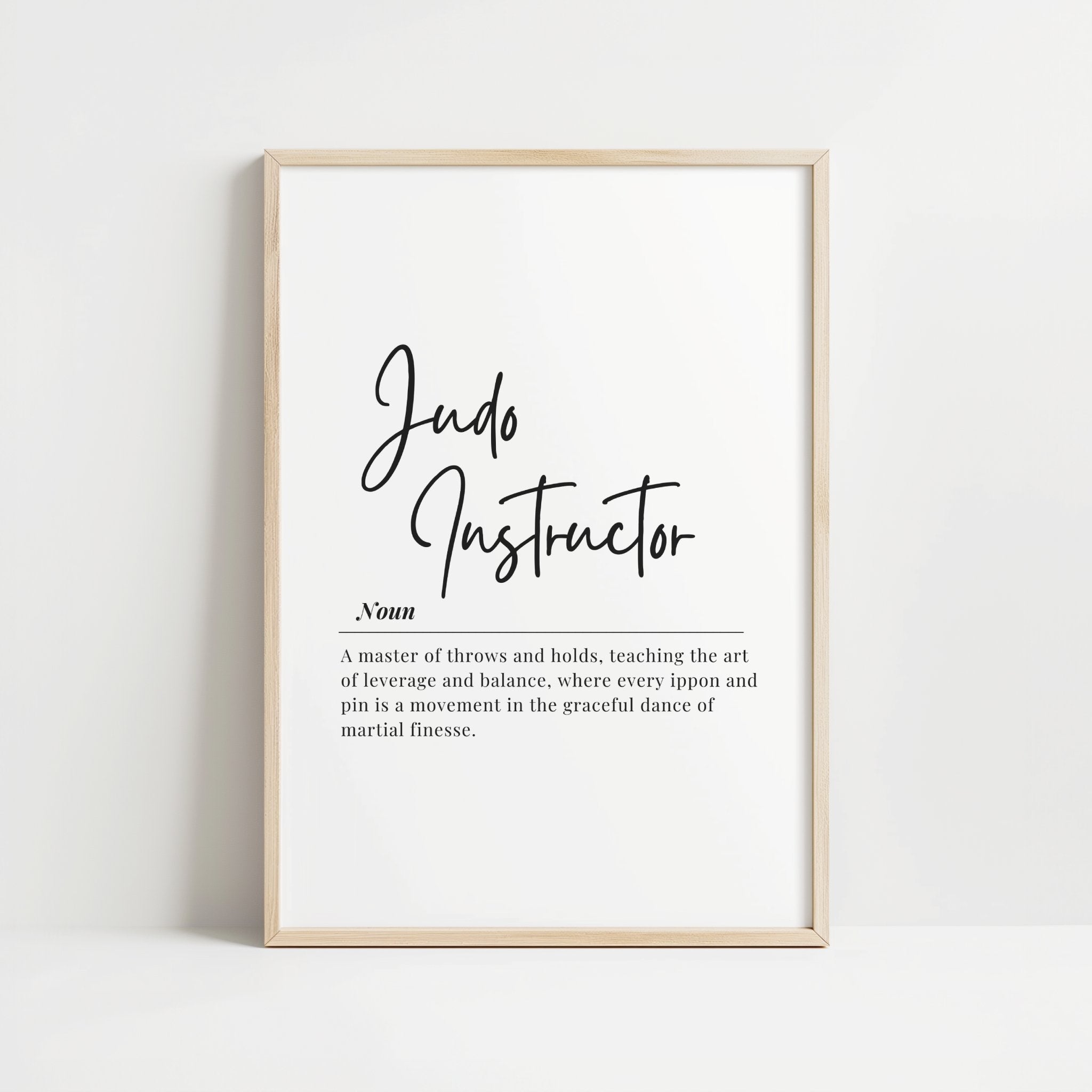 Minimalist typography wall art with 'Judo Instructor' in elegant black script on white background, featuring a definition about mastery of throws and holds, balance, and martial finesse.