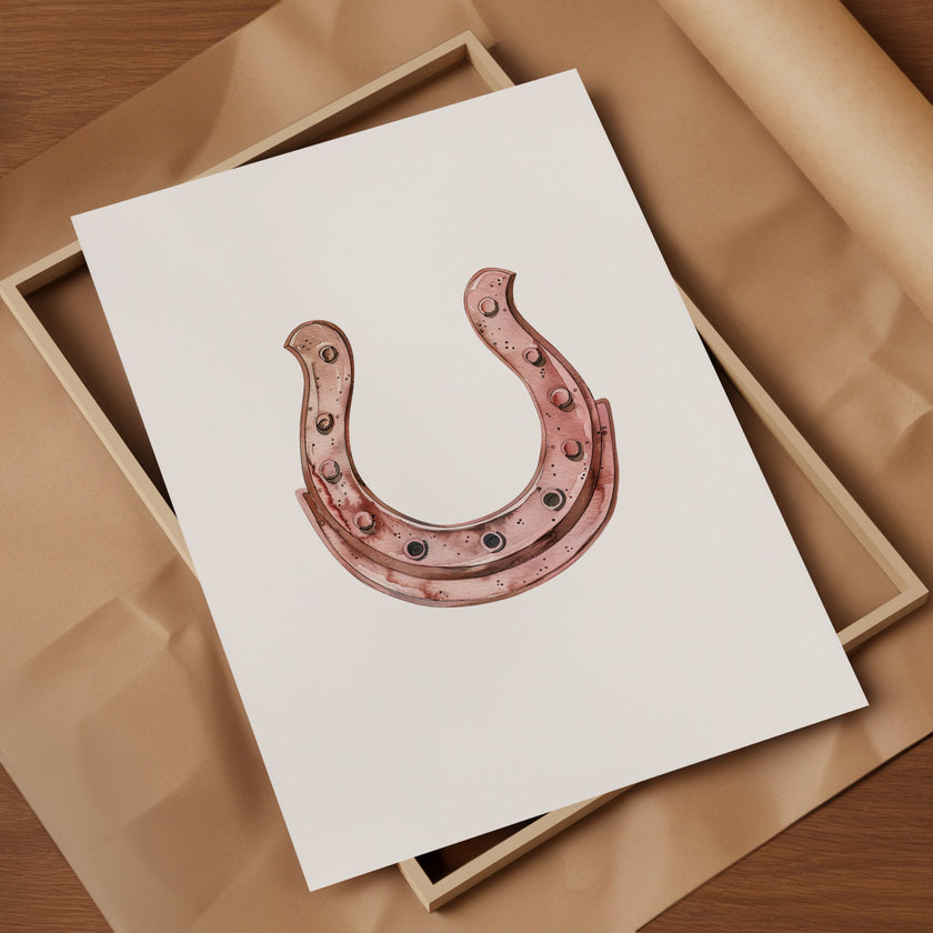 Minimalist copper horseshoe against white background in rustic frame, conveying warmth and protection through simple, elegant design perfect for farmhouse or Scandinavian decor.