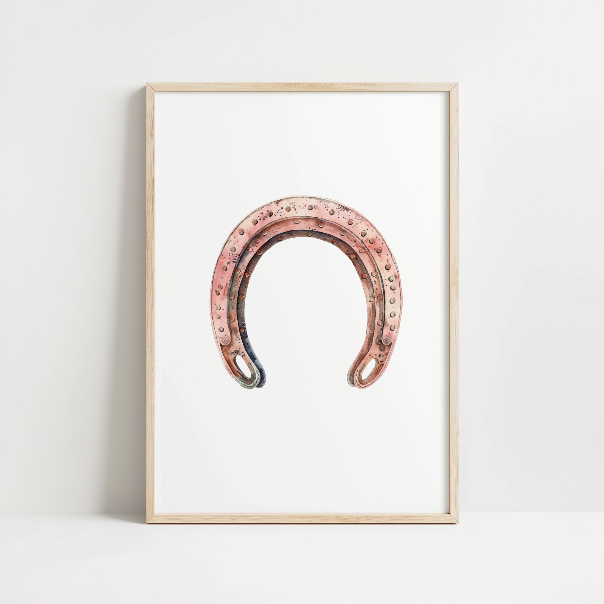 Minimalist vintage horseshoe print in warm copper tones against crisp white background, featuring rustic texturing and simple composition perfect for farmhouse and Scandinavian decor