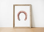 Minimalist vintage horseshoe print in warm copper tones against crisp white background, featuring rustic texturing and simple composition perfect for farmhouse and Scandinavian decor