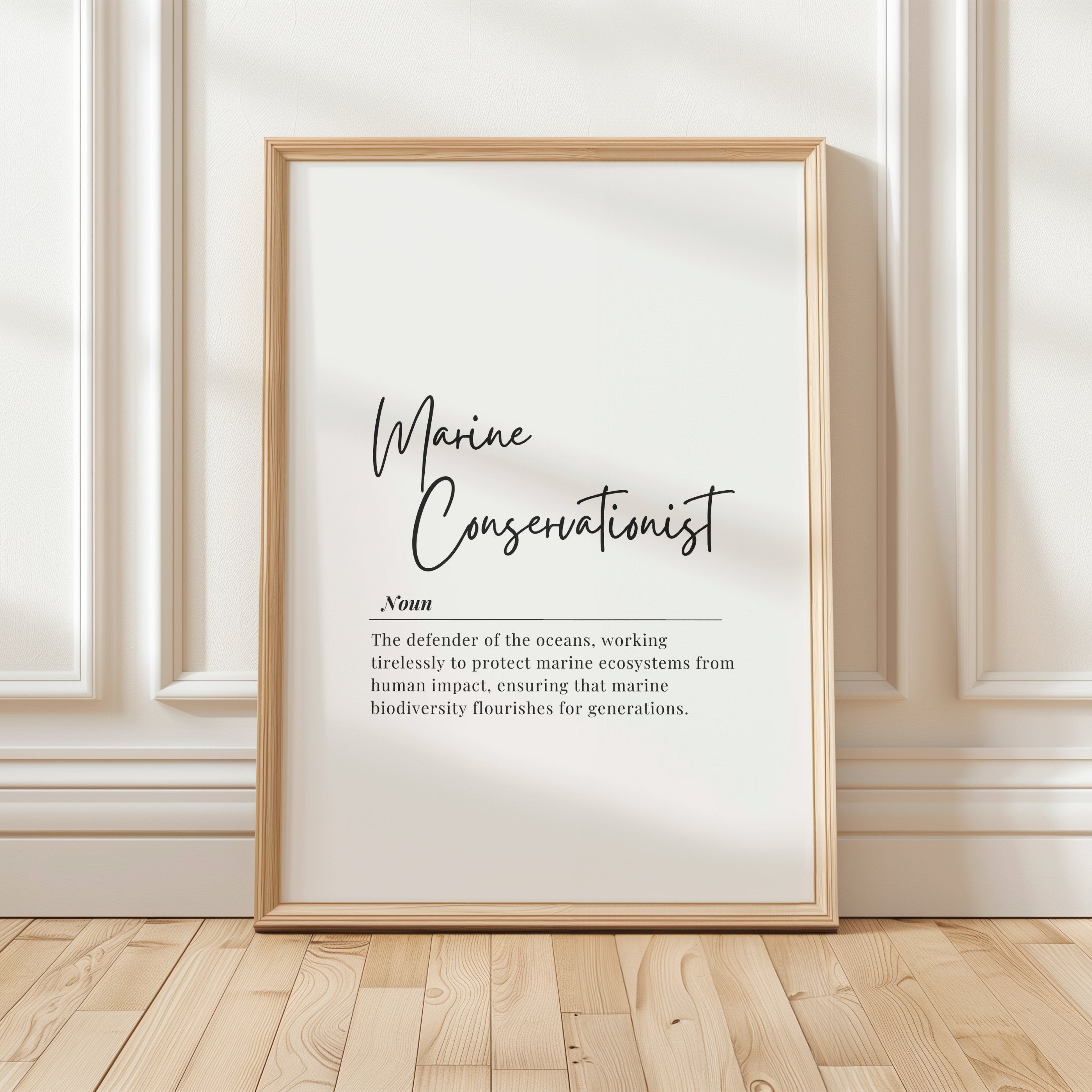 Elegant black script 'Marine Conservationist' text on white background with serif definition text, creating a clean minimalist design perfect for environmental offices and educational spaces.
