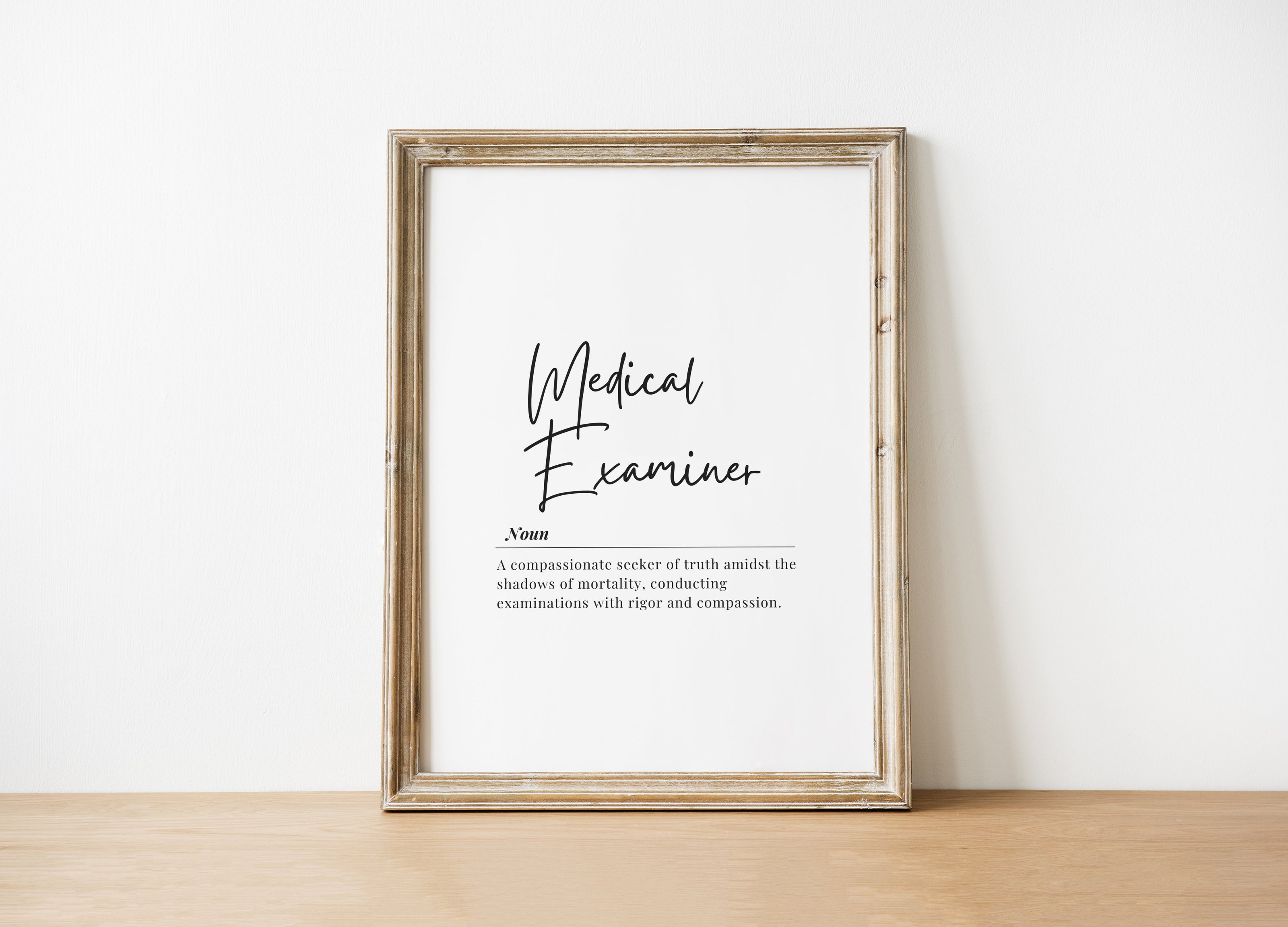 Elegant Medical Examiner definition typography print with black script font on white background, featuring inspirational text about compassion and truth in a clean, minimalist design ideal for professional settings.