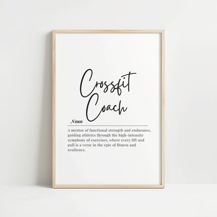 Minimalist typography print featuring 'CrossFit Coach' in bold black script against white background with inspirational definition text combining handwritten and serif fonts for professional gym spaces.