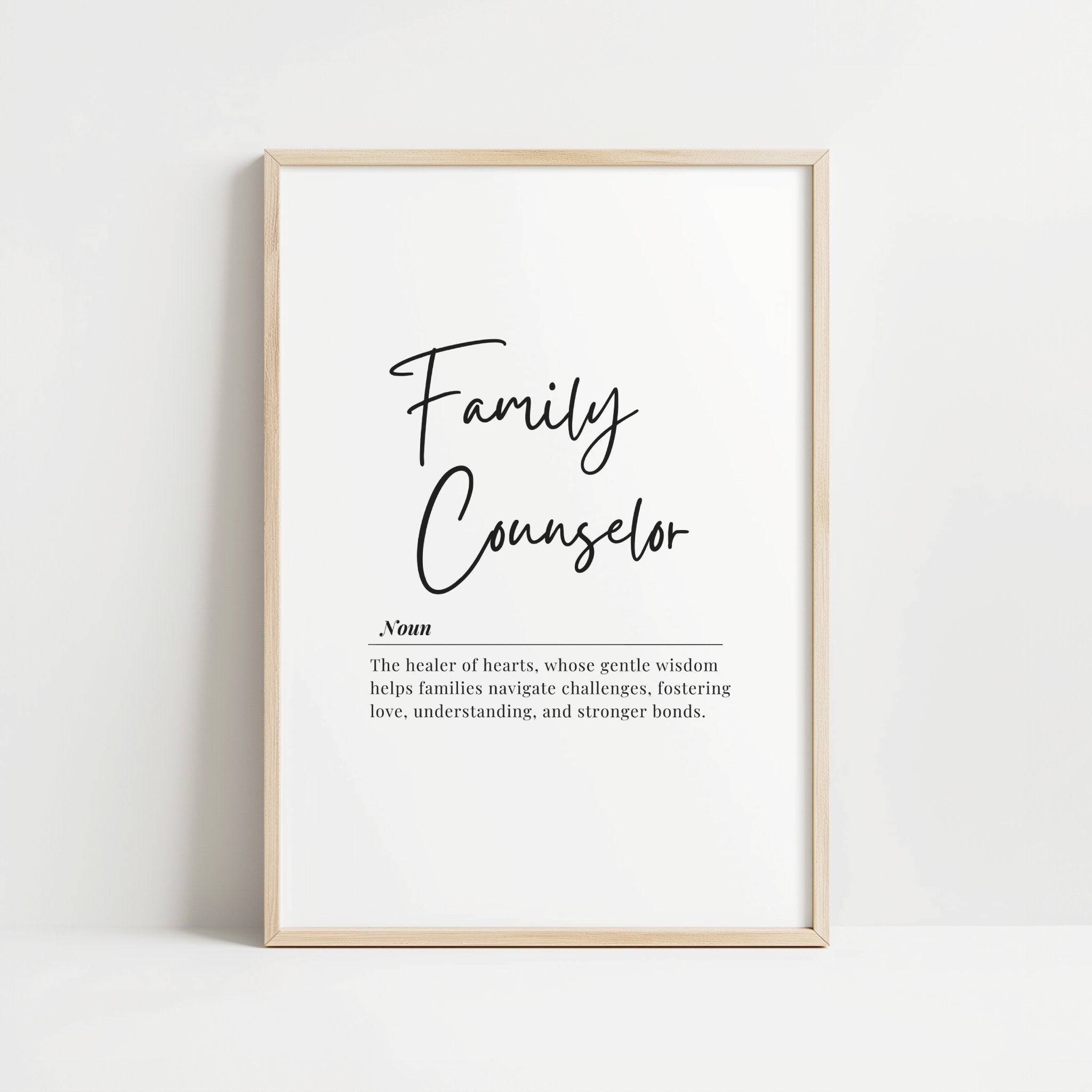 Black and white minimalist print featuring 'Family Counselor' definition in elegant script font against white background, creating a calming professional aesthetic with Scandinavian design influence.