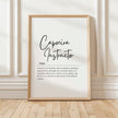 Elegant black typography print displaying 'Capoeira Instructor' definition in contrasting script and serif fonts against clean white background, framed in light wood with minimalist design for inspirational studio decor.
