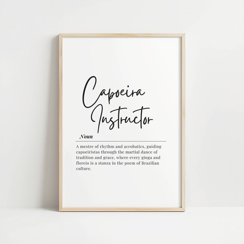 Elegant black typography print displaying 'Capoeira Instructor' definition in contrasting script and serif fonts against clean white background, framed in light wood with minimalist design for inspirational studio decor.
