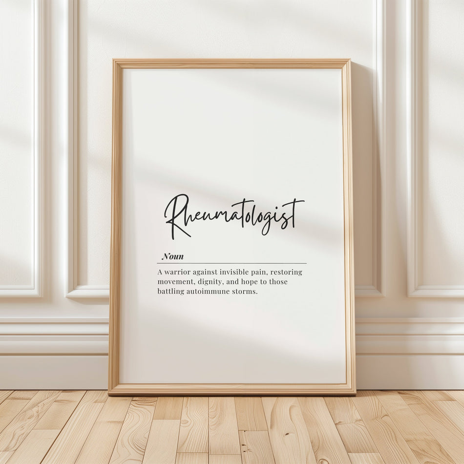 Elegant typography poster featuring 'Rheumatologist' in sleek black script with italicized definition against white background, framed by natural wood for a sophisticated, minimalist medical office aesthetic.