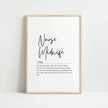 Black script font 'Nurse Midwife' with definition text below in sans-serif typography against white background, framed in natural wood, creating a sophisticated and inspirational professional display.
