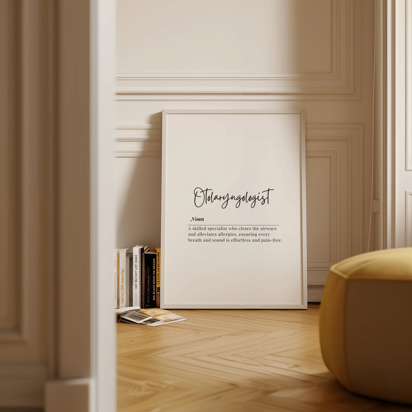 Elegant black script calligraphy of 'Otolaryngologist' definition against white background, featuring minimalist typography in a wooden frame, perfect for medical offices and clinics.