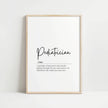 Minimalist black typography on white background displaying 'Pediatrician' definition with elegant script, framed in clean wood, perfect for pediatric offices and waiting rooms.
