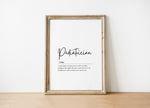 Minimalist black typography on white background displaying 'Pediatrician' definition with elegant script, framed in clean wood, perfect for pediatric offices and waiting rooms.