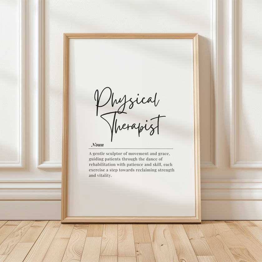 Minimalist black and white physical therapist definition print with bold script title and serif font text, showcasing professional typography against clean white background in natural wood frame.