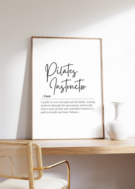 Modern black and white typography print defining 'Pilates Instructor' in elegant script font against crisp white background, conveying core strength and mindfulness with balanced composition and inspirational text.