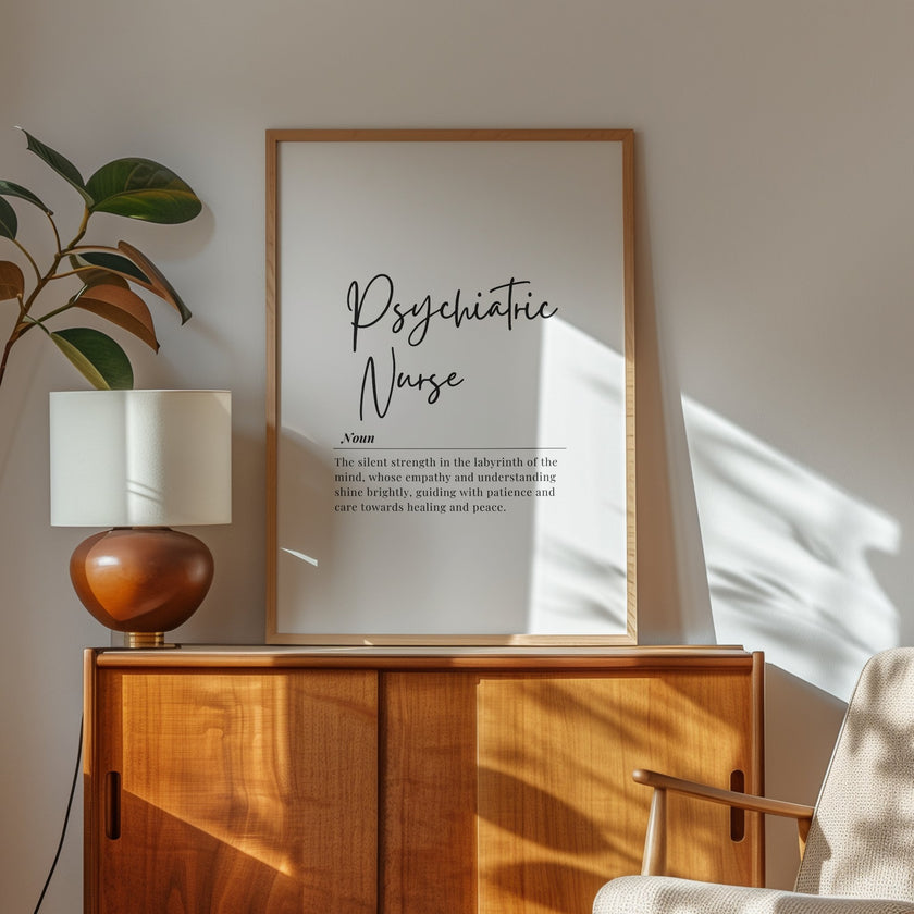 Elegant black script 'Psychiatric Nurse' with definition against white background, framed in wood, conveying empathy and healing through sophisticated typography and clean design.