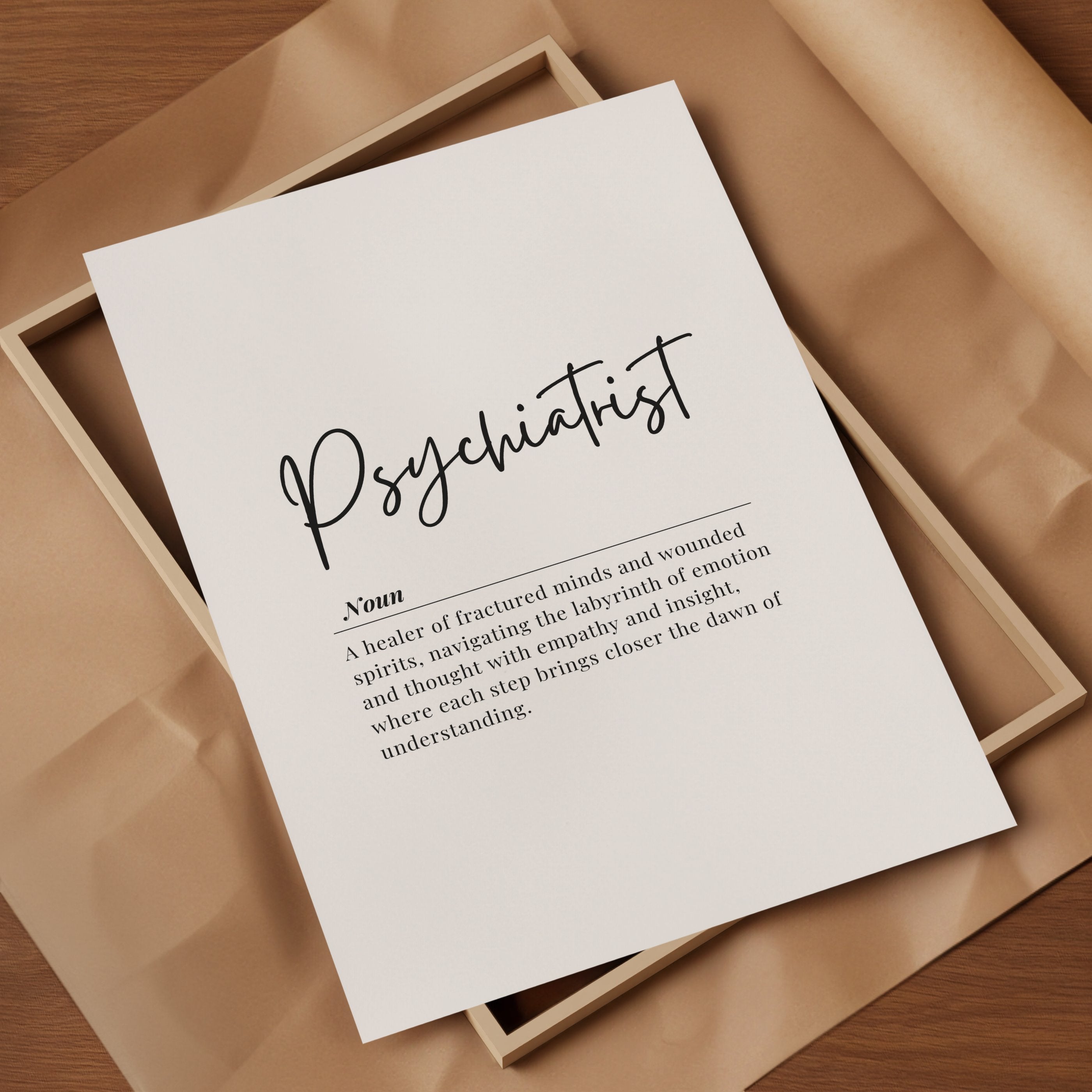 Modern typographic art featuring 'Psychiatrist' in bold serif font against a white background, with an inspirational definition in light sans-serif text, framed in natural wood.