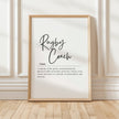 Modern typography print with 'Rugby Coach' in flowing script against white background, featuring inspirational definition about orchestrating the physical ballet of rugby, framed in natural wood.