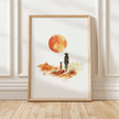 Minimalist watercolor print featuring silhouettes of a person and dog against a vivid burnt orange sunset in a desert landscape, conveying serenity and adventure in warm earthy tones.