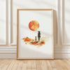 Minimalist watercolor print featuring silhouettes of a person and dog against a vivid burnt orange sunset in a desert landscape, conveying serenity and adventure in warm earthy tones.