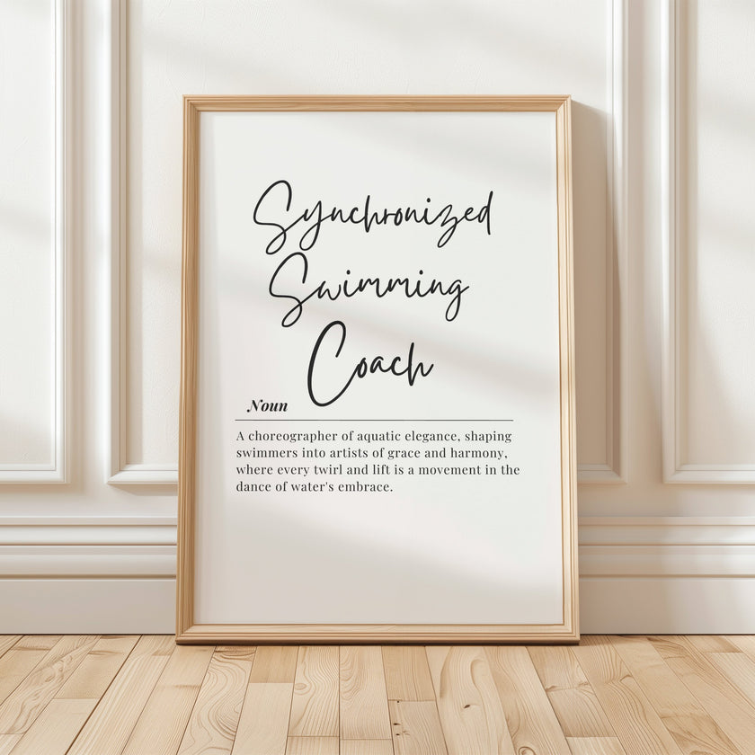 Minimalist typographic print with 'Synchronized Swimming Coach' in elegant charcoal gray script against white background, framed in clean wood, ideal for coaching offices or aquatic facilities.
