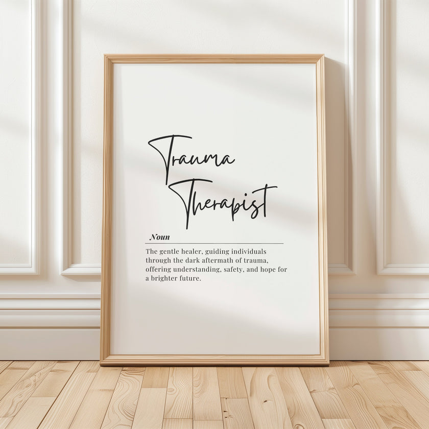 Elegant black and white typography print featuring 'Trauma Therapist' in script font with inspirational definition text against a clean white background, perfect for professional therapy settings.