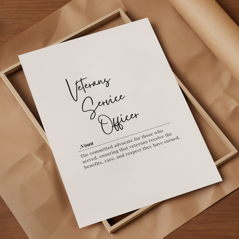 Monochromatic typography print defining 'Veterans Service Officer' in elegant script font against white background, with contrasting sans-serif text creating a professional, respectful atmosphere perfect for office display.