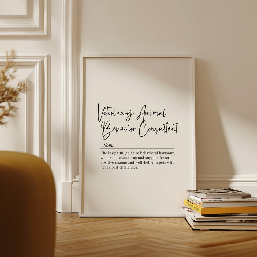 Elegant black script 'Veterinary Animal Behavior Consultant' with inspirational definition against white background in wooden frame, creating a sophisticated professional tribute to animal behavior specialists.
