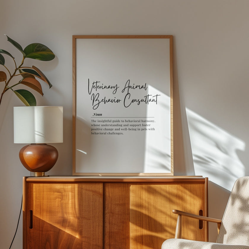 Elegant black script 'Veterinary Animal Behavior Consultant' with inspirational definition against white background in wooden frame, creating a sophisticated professional tribute to animal behavior specialists.