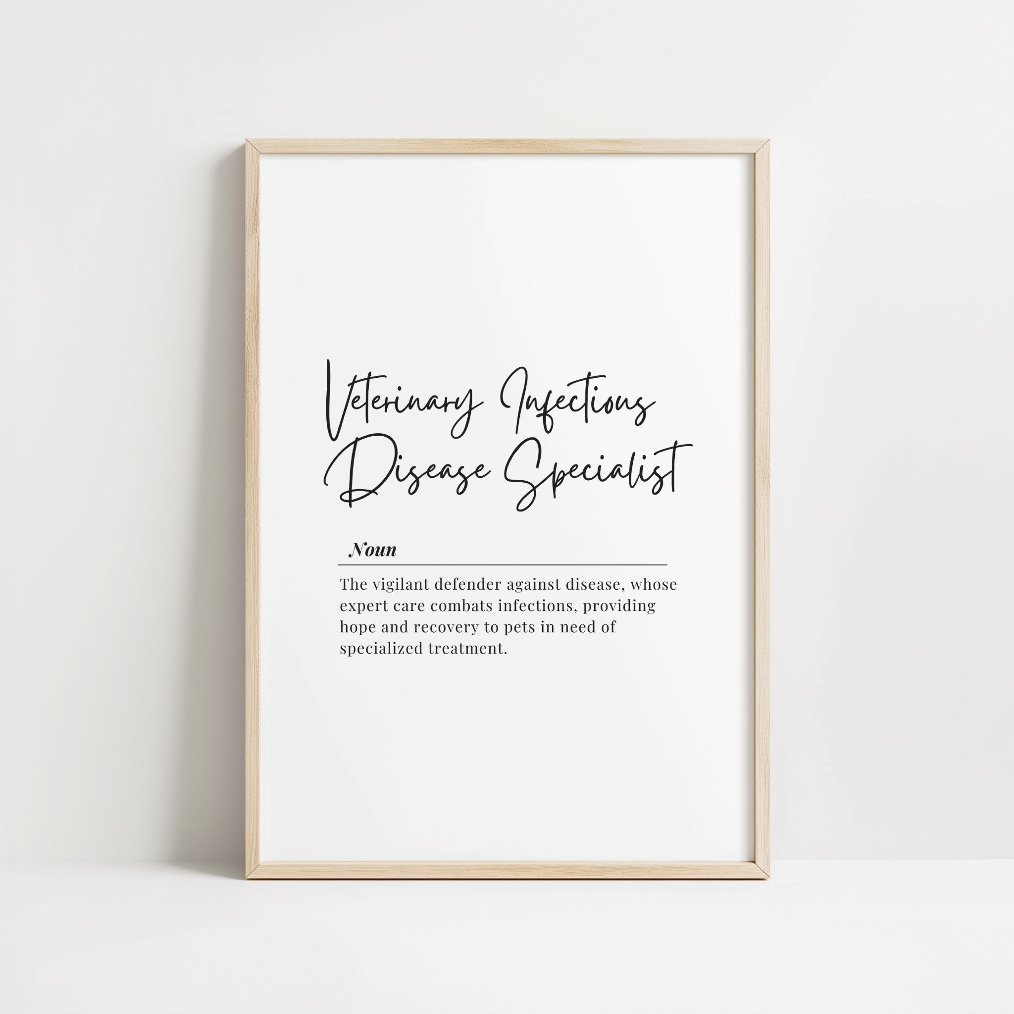 Modern monochrome veterinary definition print with elegant script title and serif text against white background, framed in natural wood, perfect for professional clinic spaces.