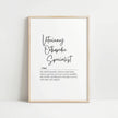Black script typography displaying 'Veterinary Orthopedic Specialist' with elegant definition text against white background, framed in light wood, conveying professional inspiration for clinical settings.