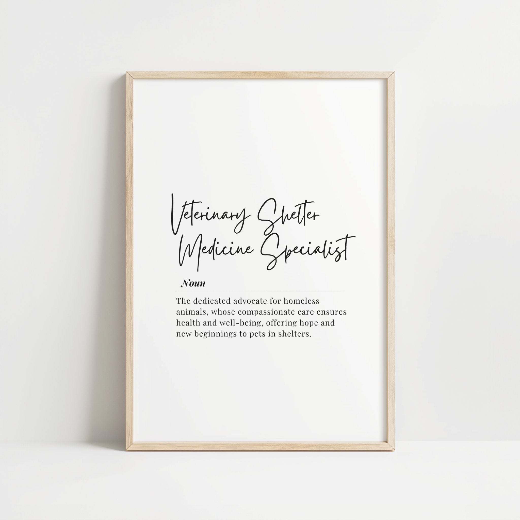 Elegant minimalist typography print featuring 'Veterinary Shelter Medicine Specialist' in black cursive script on white background with an inspirational definition quote below in serif font, framed in modern wood.