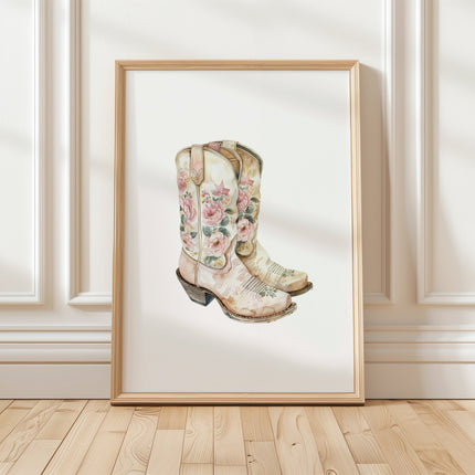 Delicate watercolor cowboy boots with intricate floral patterns in soft blush pink, cream and sage green against white background, creating whimsical rustic charm for farmhouse decor