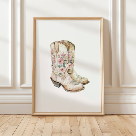 Delicate watercolor cowboy boots with intricate floral patterns in soft blush pink, cream and sage green against white background, creating whimsical rustic charm for farmhouse decor