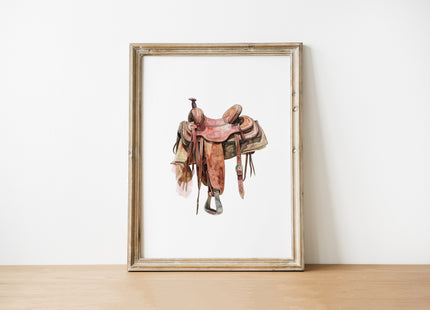 Watercolor illustration of a vintage western saddle with rich terracotta, beige and brown leather textures and detailed buckle accents against a clean white background, creating a rustic farmhouse aesthetic.