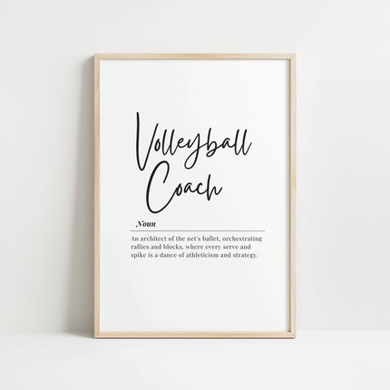 Elegant minimalist typography print featuring 'Volleyball Coach' in black cursive script on white background with inspirational definition text in serif font, presented in a sleek wooden frame.